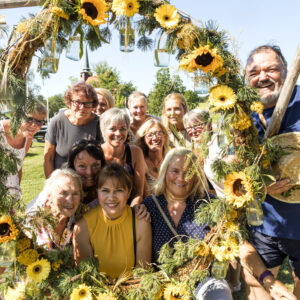 blomster ring med solsikker, frivillige, foto punkt